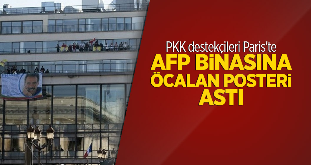 PKK destekçileri Paris'te AFP binasına Öcalan posteri astı