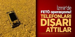 İzmir'de FETÖ operasyonu! Telefonları dışarı attılar